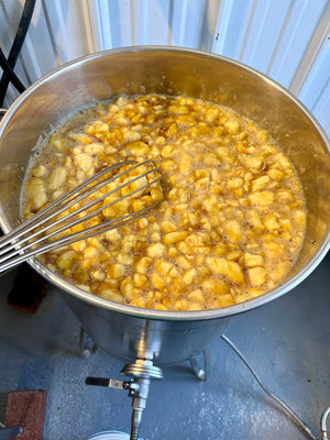 Raw Organic bananas cooking in the pure maple syrup