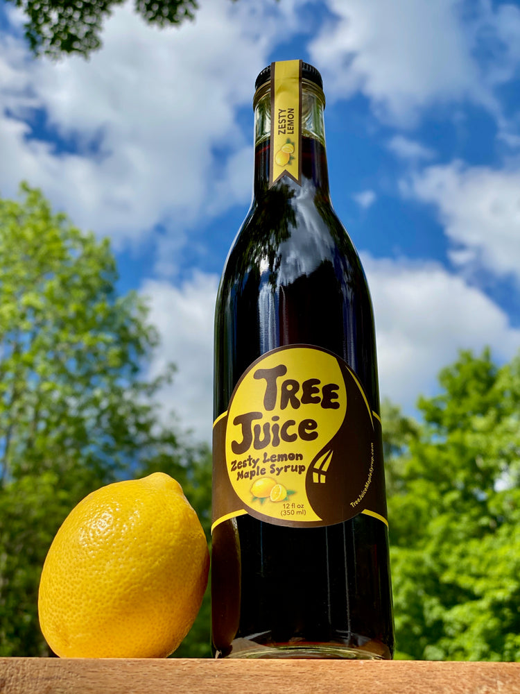 Tree Juice Zesty Lemon Maple Syrup with sky backdrop