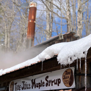 Tree Juice Maple Syrup saphouse with steam rising