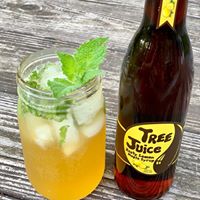 tree juice maple mojito and 12oz bottle of lemon maple syrup